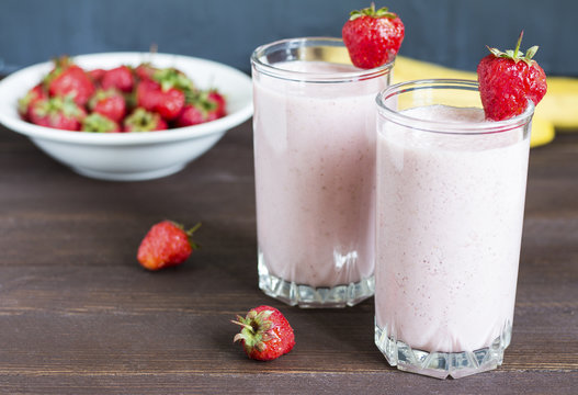 Strawberry banana smoothie healthy breakfast drink in glass