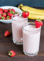 Strawberry banana smoothie healthy breakfast drink in glass
