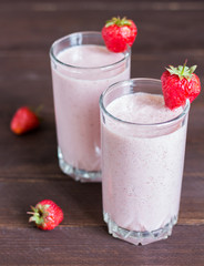 Strawberry smoothie healthy breakfast drink in glass