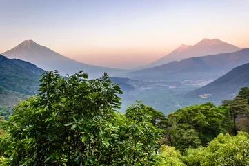 Gordijnen Dawn over three volcanoes: Agua, Fuego & Acatenango, near Antigua, Guatemala, Central America © Lucy Brown