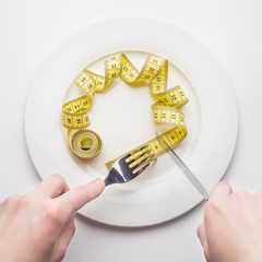 Diet concept, measuring tape, lose weight, reset the waist by 6 centimeters
