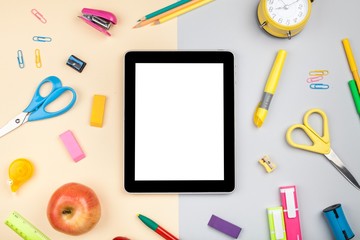 School and office supplies on tablet.
