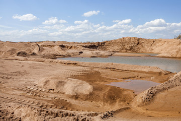 sand quarry with lake.