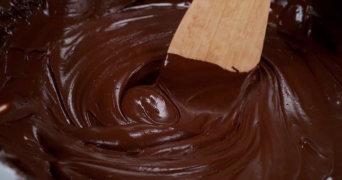 Wooden Spoon Turning Milk Chocolate, Slow Motion 4K