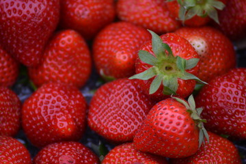 Close up on piled up strawberries