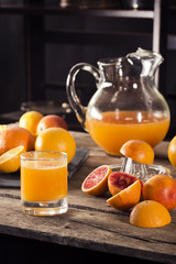 Oranges Being Squeezed for Fresh Orange Juice