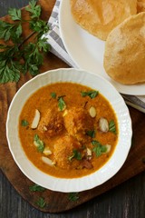 Malai Kofta - Classic north Indian dish with Paneer potato balls tossed in rich tomato cream base gravy