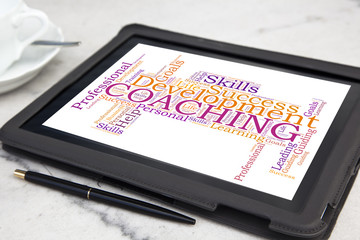tablet with coaching word cloud