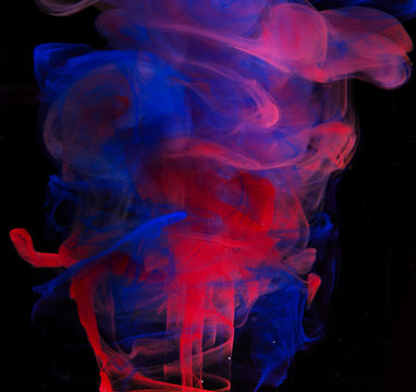 red and purple ink acrylic dropping in water