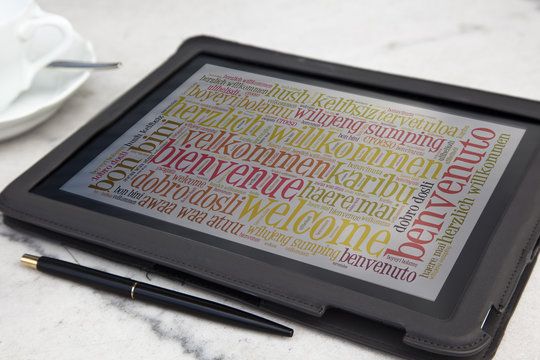 tablet with welcome word cloud