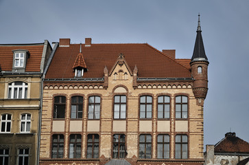 Fototapeta na wymiar Street with historic tenement houses in Poznan.