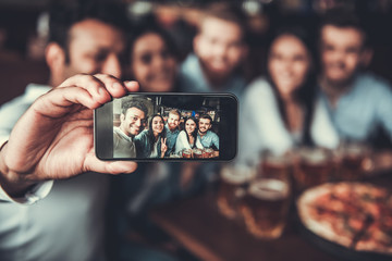 Friends makes selfie - Powered by Adobe