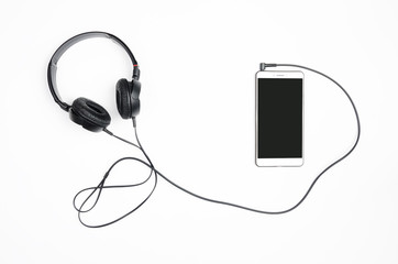 Headphones with smartphone on a white background.