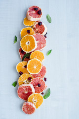 Orange and grapefruit salad with mint leaves