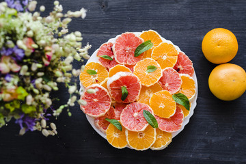 Orange and grapefruit salad with mint leaves