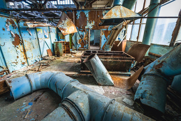 Main hall of former factory in Pripyat desolate city in Chernobyl Exclusion Zone, Ukraine