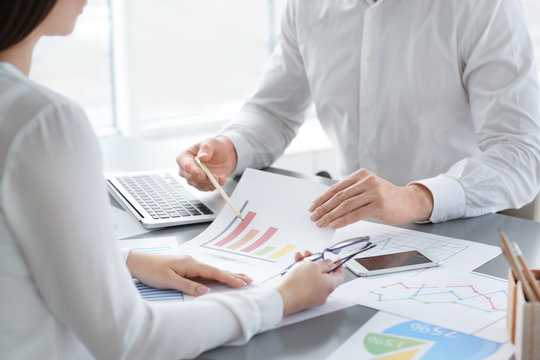 Business people working in office, closeup