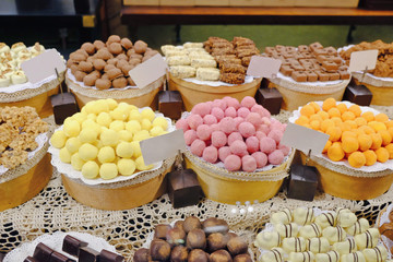 Various tasty sweets in candy shop