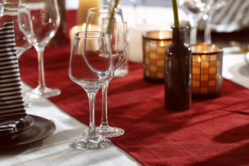 Empty glasses on table in restaurant