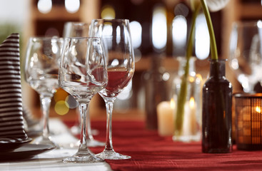 Empty glasses on table in restaurant