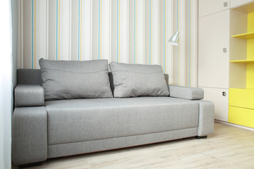 Sofa in modern living room interior