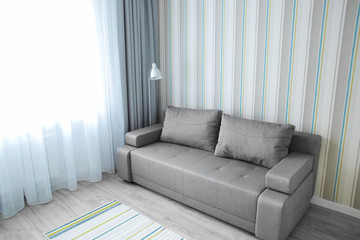 Sofa in modern living room interior