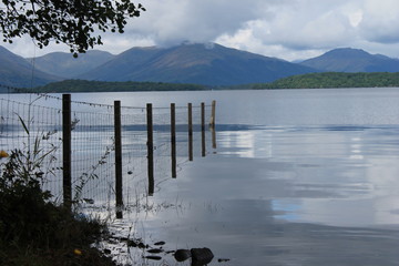 Loch Lomond, Scotland. View across Loch lake from low perspective boat in view stock, photo, photograph, image, picture, 
