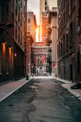 Foto op Plexiglas Red bricks building at New York City street at sunset time. © Nick Starichenko