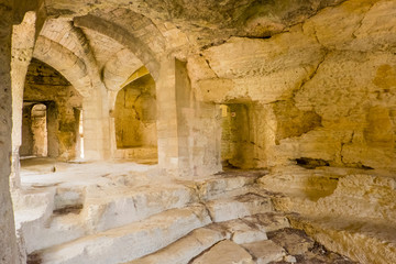 France,Beaucaire, The Abbey of Saint-Roman is a cave monastery. The site includes the ruins of a castle, the château de Saint-Roman-d'Aiguille, a chapel, cloisters, terrace, burial tombs and walls.