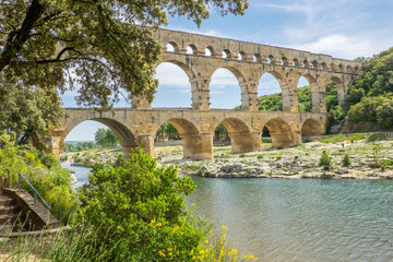 Fototapeta na wymiar France,Nimes,the Pont du Gard is an ancient Roman aqueduct bridge that crosses the Gardon River. It is made of limestone between 40-60 AD.