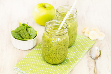 Green Smoothies On Dotted Napkin With Spinach and Apple and Banana
