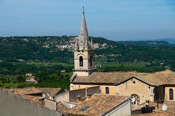 Fototapeta na wymiar France, Gordes, Provence, Church spire overlooking the valley below.