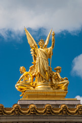 Fototapeta na wymiar Paris palace golden statue blue sky clouds shiny