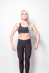 Fototapeta premium isolated studio shoot of an athletic looking blonde female