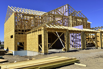 Residential wood frame home under construction.