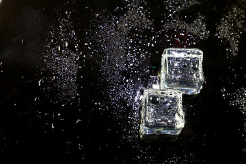 ice cubes on black background.