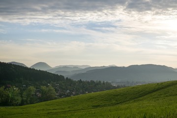 Sunrise and sunset over the hills and town. Slovakia