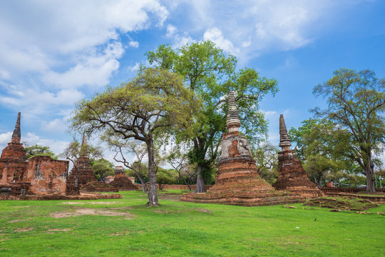 Ruins of buddha statues and pagoda of Wat Phra Si Sanphet in Ayutthaya historical park, Thailand