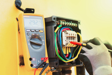 electrician,Hand of electrician on the job function check electical system