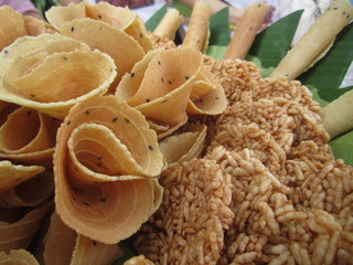 thai crispy golden curl and rice cracker, thailand traditional snack called Thong Pab and Khaotan