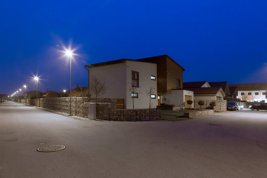 house on a street corner at night
