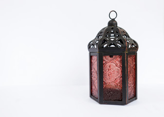 Vintage metal lantern on white background