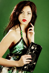 fashion woman on green background 