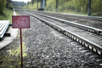 Red nameplate against rails for text or numbers.