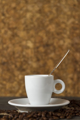cup of coffee with coffee beans