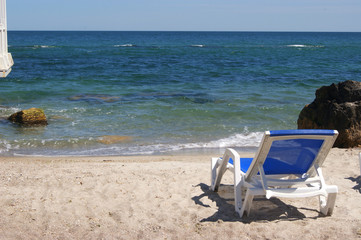 Fototapeta na wymiar Chaise longue summer beach