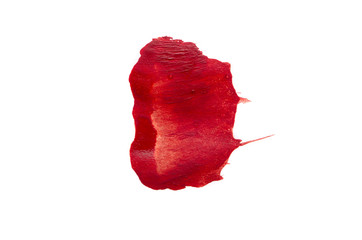 Smear of red paint on white background