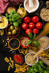 Food background Food Concept with Various Tasty Fresh Ingredients for Cooking. Italian Food Ingredients. View from Above.