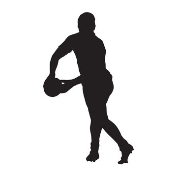 Rugby player passing ball, vector silhouette