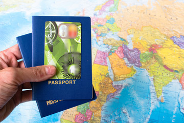 Blue passports on map background